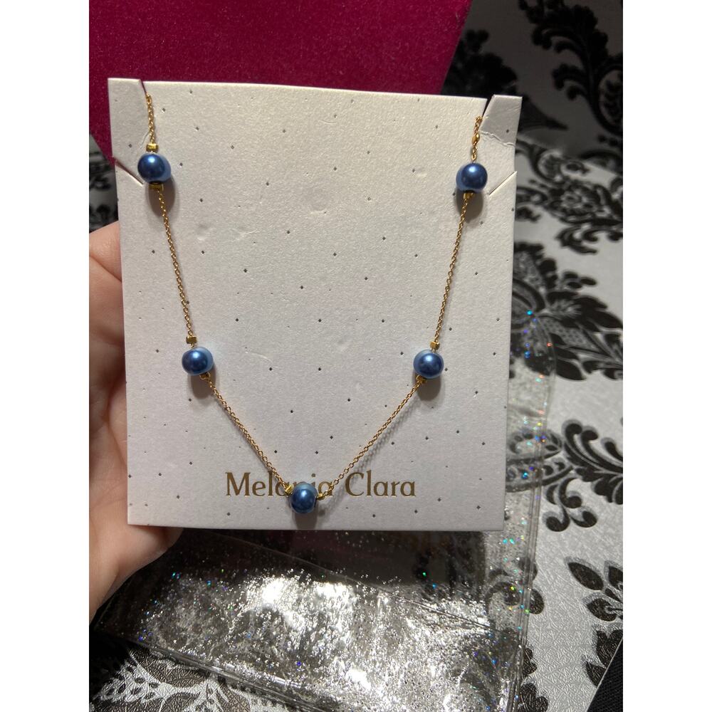 Melania Clara gold with dark blue beads necklace